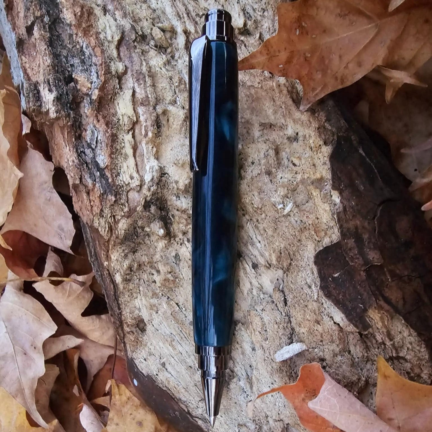 Side view of one of several rollester pens