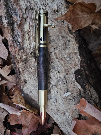 Side view of the unique design with the bolt action to use the pen