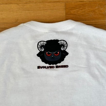 Close-up white t-shirt with evolved breed logo
