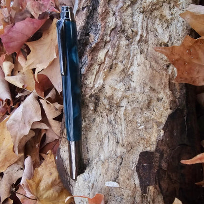 Blue rollester pen with cap on