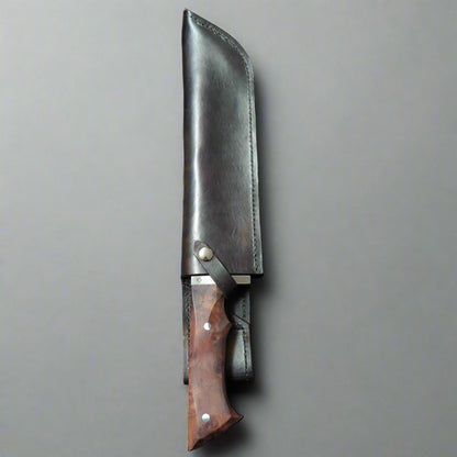 Sheathed brown rambowie knife