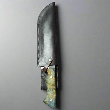 Sheathed green rambowie knife