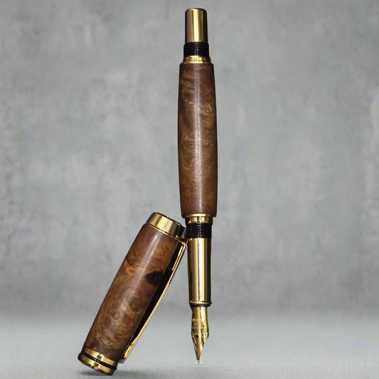 wood and gold feather pen bulit with elegance